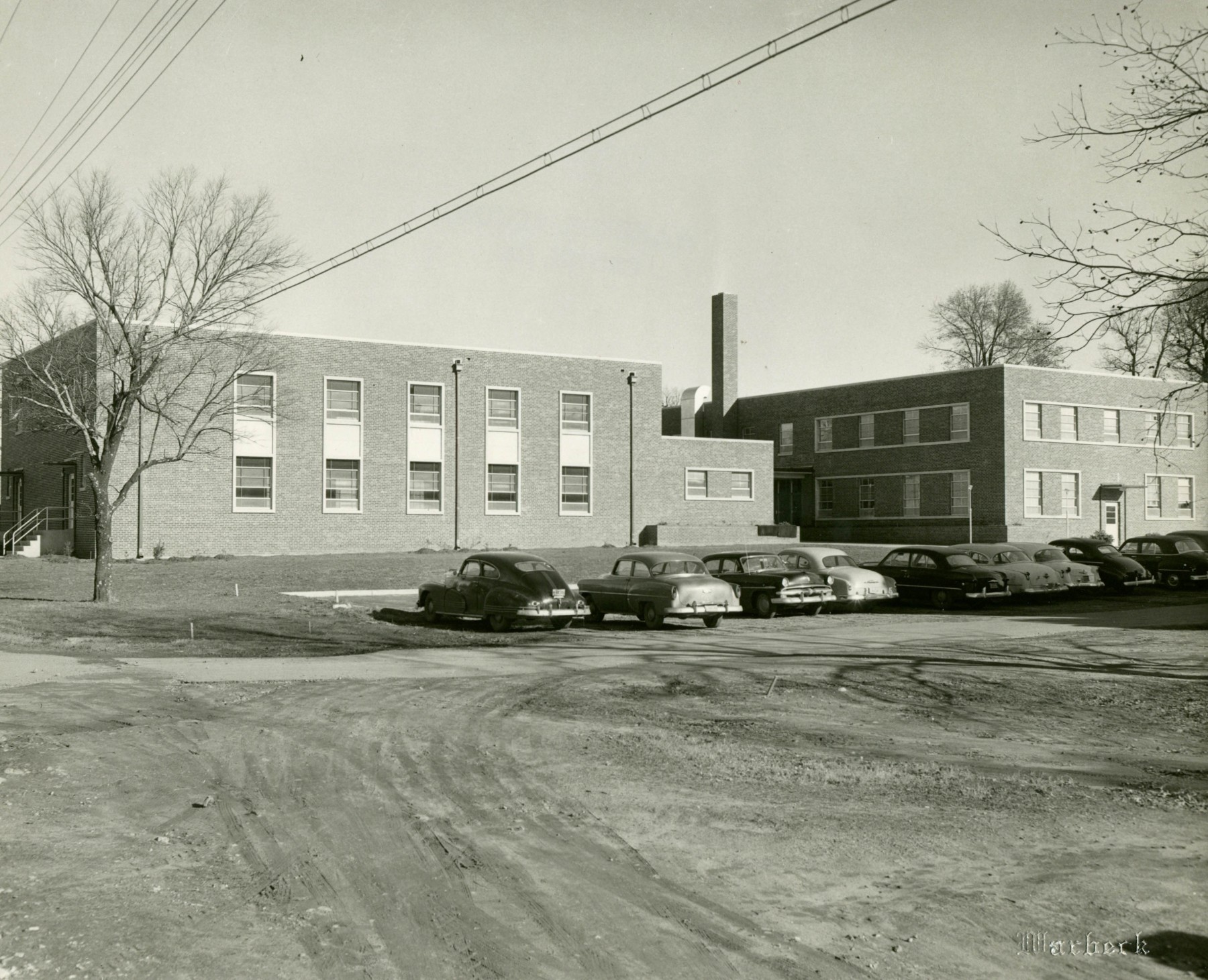 Historic photo of the Stuckey Building on campus.